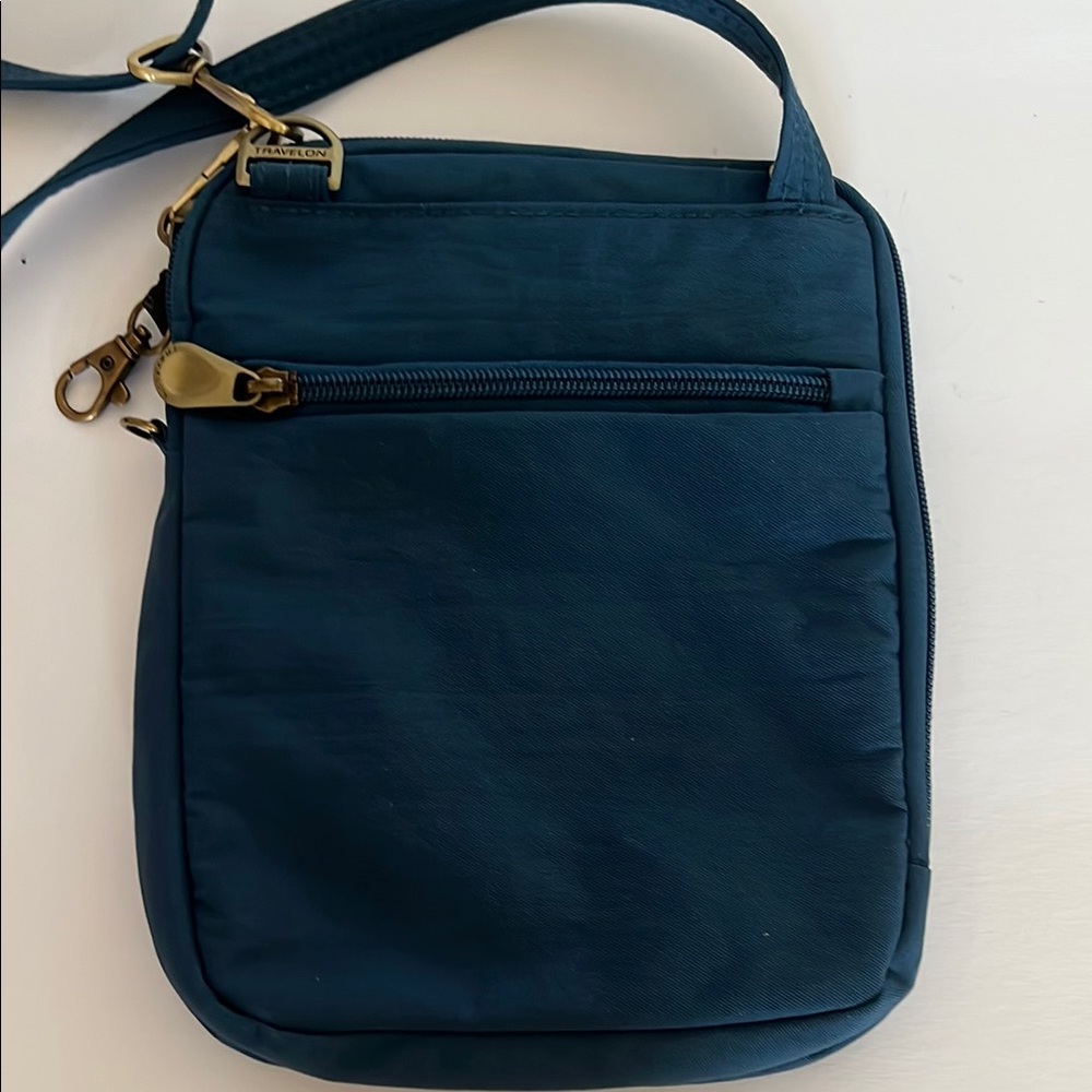 Travelon AntiTheft Signature Slim Pouch Quilted Blue Crossbody Bag - Picture 2 of 9
